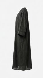 Side view of the black striped satin abaya showing the turned-up cuff
