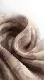 Close-up of the soft lilac and cream watercolour floral fabric