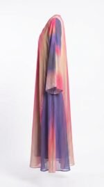 Side view of the ombré chiffon abaya showing the layered chiffon and wide sleeve